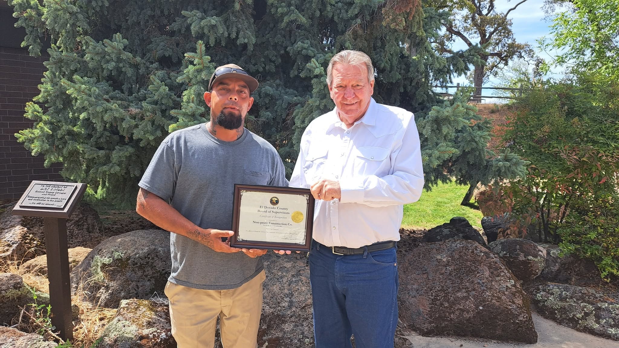 El Dorado County District 2 Supervisor George Turnboo presenting a Certificate of Recognition from the El Dorado County Board of Supervisors to Caleb Armstrong, President and CEO of Non-Profit Construction Corporation
